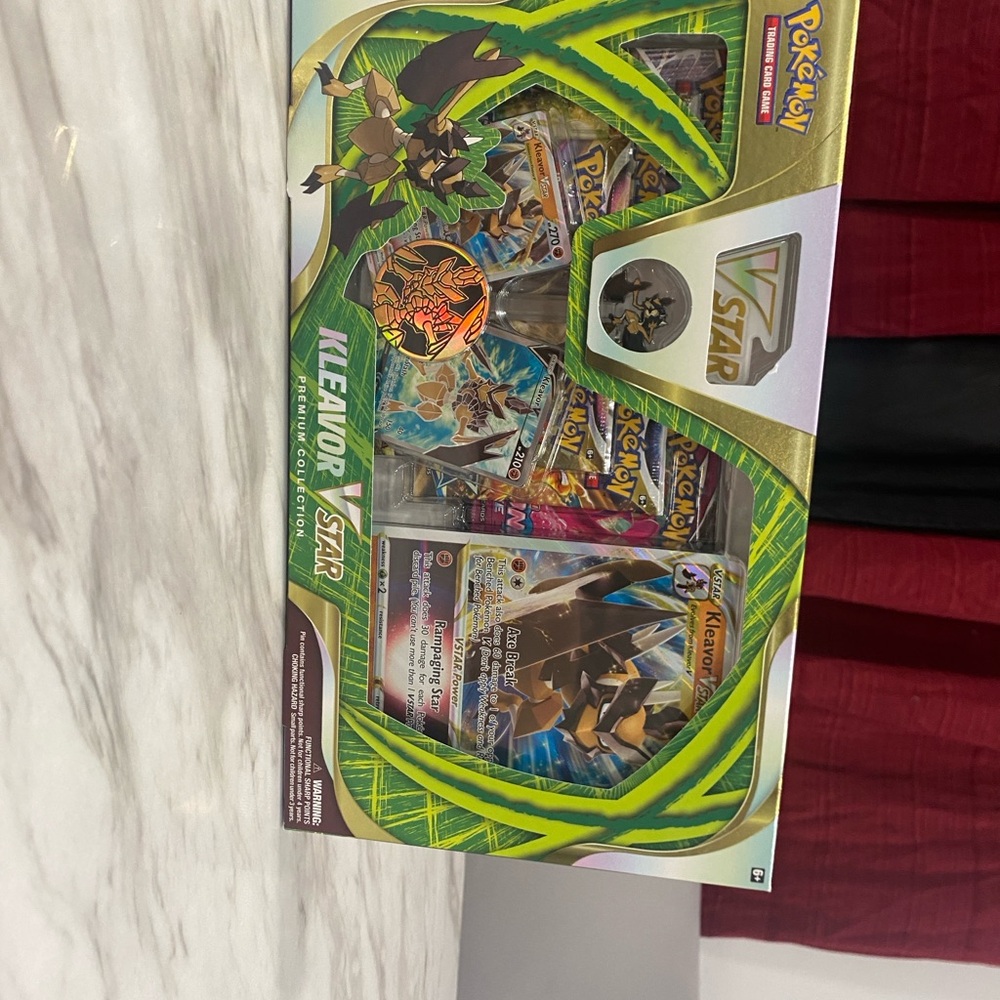 Pokemon Kleavor VSTAR Collection with Green and Yellow Accents